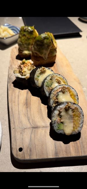 Smoked meat rolls in front & at back was the kimchi jackfruit ones  at Sushi Momo in Montreal