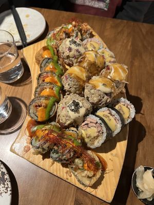 Assortment of rolls, crispy rolls and sticky rice  at Sushi Momo in Montreal