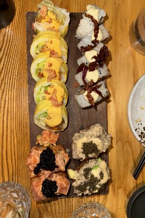 Big Momo, Kara-Age, Oyster Mushroom & Truffle, and Salmon & Caviar  at Sushi Momo in Montreal