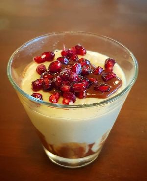 Creamy choclate desert with pomegranate at Veganatural in Giessen