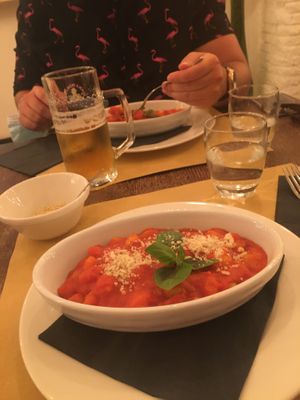 Vegan gnocchi with vegan parmesan at Origano Trevi in Rome