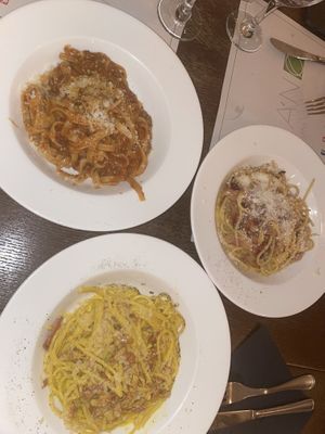 My family’s non-vegan dishes next to my vegan dish - all look GREAT!   at Origano Trevi in Rome