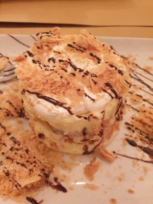 Mille feuille custard dessert with chocolate drops at Origano Trevi in Rome