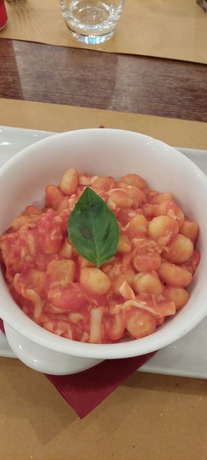 Ñoquis con salsa y queso vegano at Origano Trevi in Rome