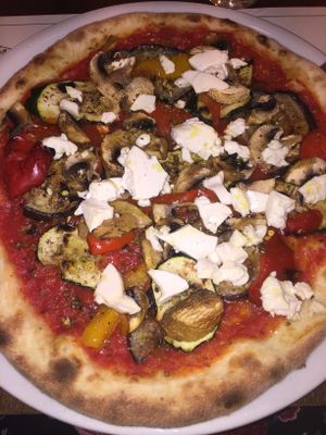 Vegan tofu and vegetable pizza at Origano Trevi in Rome