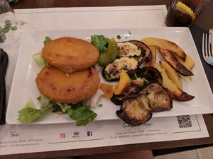 Soy cutlets with delicious aubergines and baked potatoes at Origano Trevi in Rome