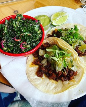 Chorizo Seitan Tacos with a side of Kale Salad  at Jungle Cafe in Brooklyn