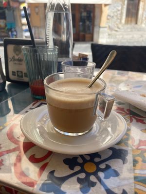 Iced caffe latte with almond milk   at Licchio's Bar in Taormina