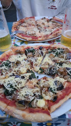 Pizza Funghi and Vegetariana with vegan cheese. at Licchio's Bar in Taormina