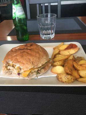 Bite out of burger at Black Mamba Burgers and Records in Porto