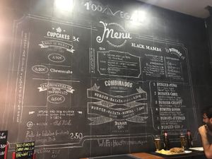 Menu board  at Black Mamba Burgers and Records in Porto