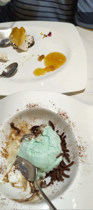 Half eaten peach cheesecake and spaghetti mint after 8 at Ristorante Da Mario alla Fava in Venice