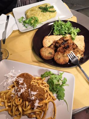 Asparagus risotto, brown rice and tofu croquettes with caponatta, tagliatelle with seitan rague at Il Vegano Bistrot in Florence