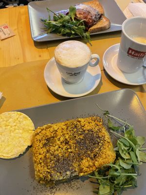 (Up) Eggplant Parmigiano (Down) Crumble of Tempeh on a bed of potatoes   at Il Vegano Bistrot in Florence