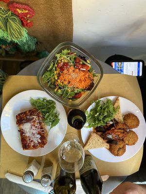 Salad (back) lasagne (front left) croquettes (front right)   at Il Vegano Bistrot in Florence