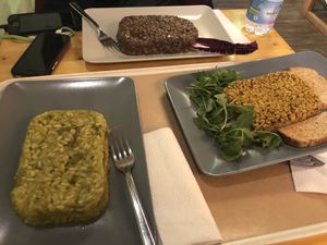 Mushroom risotto, Asparagus risotto, and tempeh crumble with mashed potatoes. Delicious!! at Il Vegano Bistrot in Florence