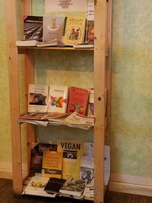 Vegan bookshelf library at Il Vegano Bistrot in Florence
