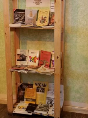 Vegan bookshelf library at Il Vegano Bistrot in Florence