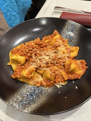 Cappelletti ripieni di formaggio veg al ragù di soia   at Amaranto in Ravenna