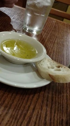 Bread is NOT Vegan. I had to listen to my stomach growl, while my husband are bread. They serve a vegan sandwich on bread.....multi use not utilized. at Soup Spoon Cafe in Lansing