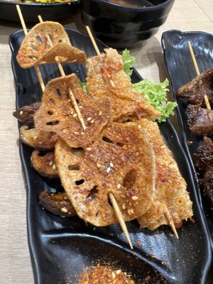 Upclose of the greasy “grilled” items  at Greendot 绿一点 - Paya Lebar in Central Singapore