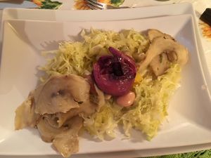 Cabbage, homemade seitan with olive oil and lemon, sweet and sour radicchio and beans  at Locanda Itinerande in San Lorenzo Dorsino