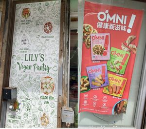 SIgns in window at Lily's Vegan Pantry in New York City