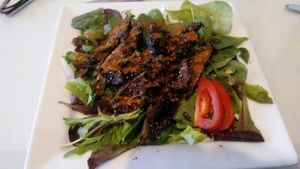 mushtook steaks over greens   at Lov'n It Live in East Point