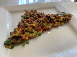 Slice of pizza at Lov'n It Live in East Point