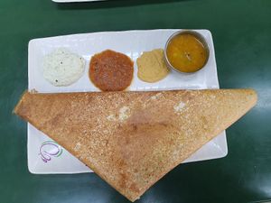 Breakfast Thosai Masala with coconut chutney, onion chutney, and chickpea. Looks big but it's just right! at Ananda Bhavan - Buffalo Rd in Central Singapore