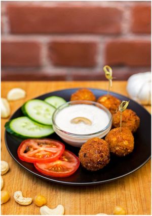 Vegan falafels with garlic cashew sauce. at Vegan Inspiratsioon in Tallinn