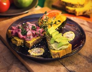 Garlic breads with beetroot-potatoe salad, hummus, avocado and tomato at Vegan Inspiratsioon in Tallinn