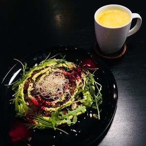 Chickpea-veggie omelette with hot sea buckthorn-ginger drink! mmm... at Vegan Inspiratsioon in Tallinn