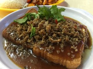A18 (I think), the radish fried tofu. it's salty due to the fried radish but goes really well with rice. not spicy at Hong Hoo in West Singapore