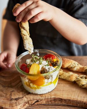 Ricotta di mandorle ai sapori mediterranei, pomodorini confit, capperi fritti con frustina di pane alle olive at Romeow Cat Bistrot in Rome