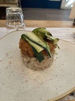 Jackfruit with fried tomato and sesame zucchini at Romeow Cat Bistrot in Rome
