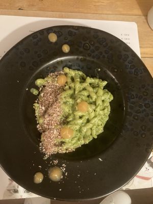 Pasta with pesto, fermented tomato and crispy citrus panko   at Romeow Cat Bistrot in Rome