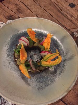 Cerchio con crema alle fave e fiori di zucca at Romeow Cat Bistrot in Rome