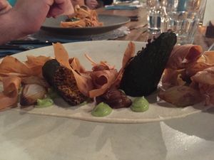 Courgette stuffed with cashews, with chopped pistachios, macadamia nuts cream, avocado and mint cream and small marinated onions at Romeow Cat Bistrot in Rome