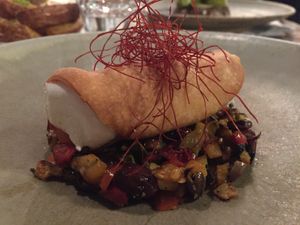 Savoury sicilian cannoli with almond ricotta and chives filling and summer vegetables caponata  at Romeow Cat Bistrot in Rome