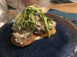 Jack fruit with zucchini, fried green tomatoes  at Romeow Cat Bistrot in Rome