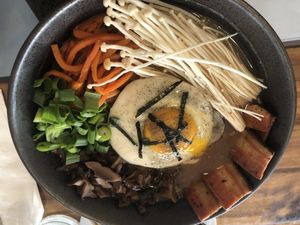 Shoyu ramen - “pork belly “ sunny side “egg” , braised shiitake, marinated carrots, scallions, enoki, nori, chili oil   at Beyond Sushi in New York City