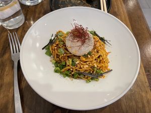 New dish on the menu - Chili 🌶️ Noodle with a vegan ‘egg’ on the top - very delicious   at Beyond Sushi in New York City