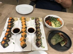 So delicious! Mushroom rice roll, salad, and three different rolls here  at Beyond Sushi in New York City