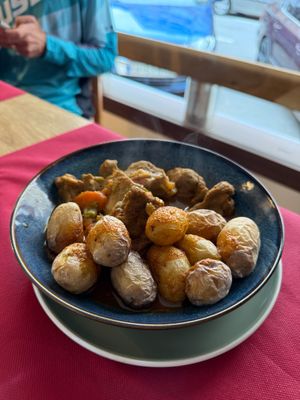 Seitan con patatas  at Estacion Quimera in Malaga