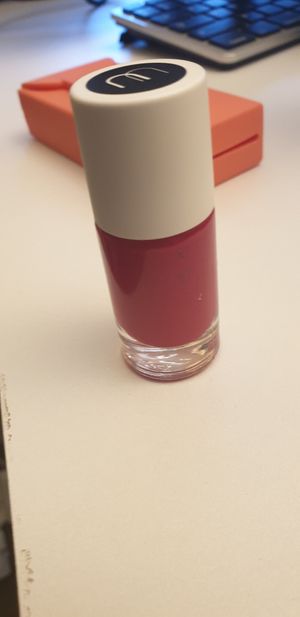 Red nail polish at Veganie in Paris