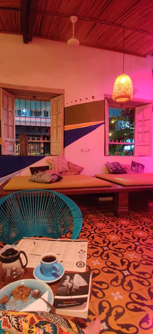Comfy spot. They have quite good books available. at Ikaro Cafe in Santa Marta