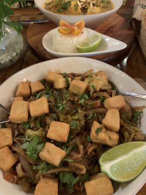 Pad thai (great) with the thai curry at the back (not great)  at Ikaro Cafe in Santa Marta