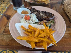 Eggplant and rice dish with sweet potato fries at Ikaro Cafe in Santa Marta