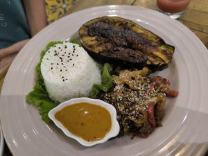 Berenjena con panela, pisto y arroz at Ikaro Cafe in Santa Marta